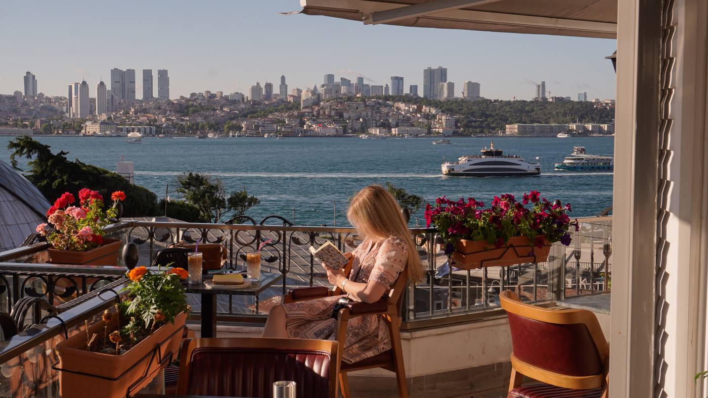 Reading on a terrace above the Bosphorus, Istanbul
